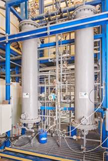 A large industrial machine with pipes

AI-generated content may be incorrect.